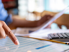 Person calculating business expenses