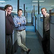 LinkedIn CEO Reid Hoffman, left, Vice President of Desktop Products Eric Ly and 